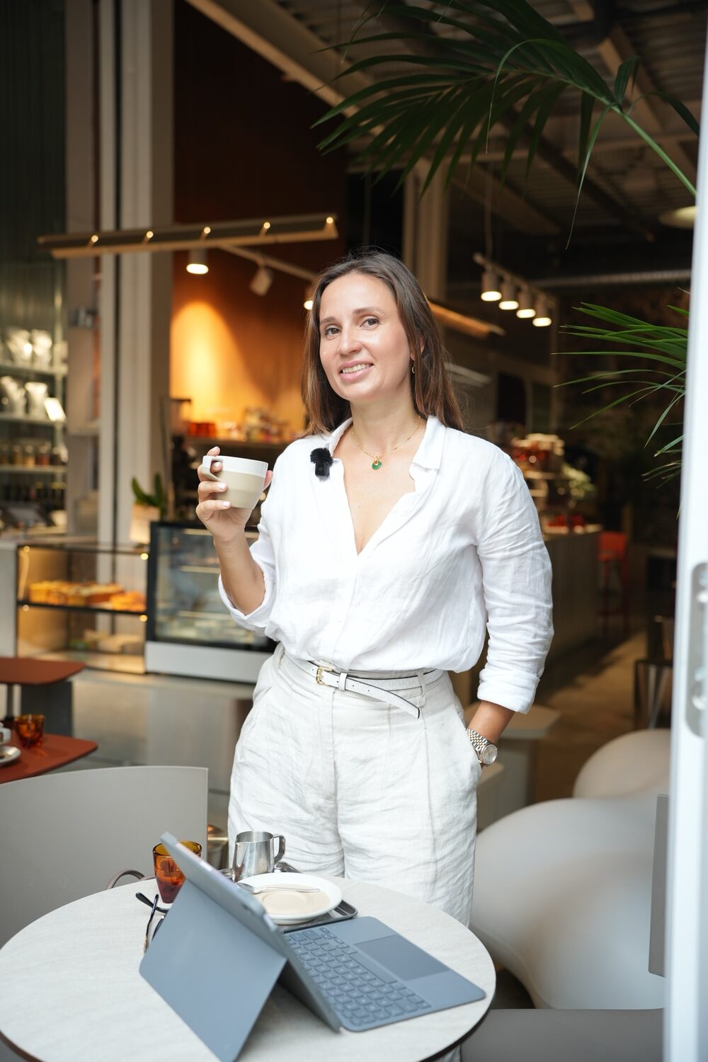 The founder of The Corporate Jardín with a coffee in a café in Las Palmas